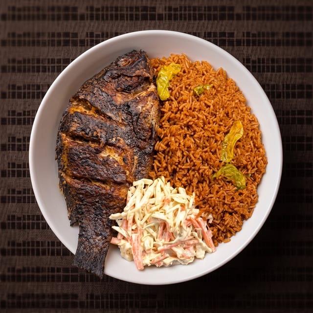 Grilled Tilapia with Jollof Rice.