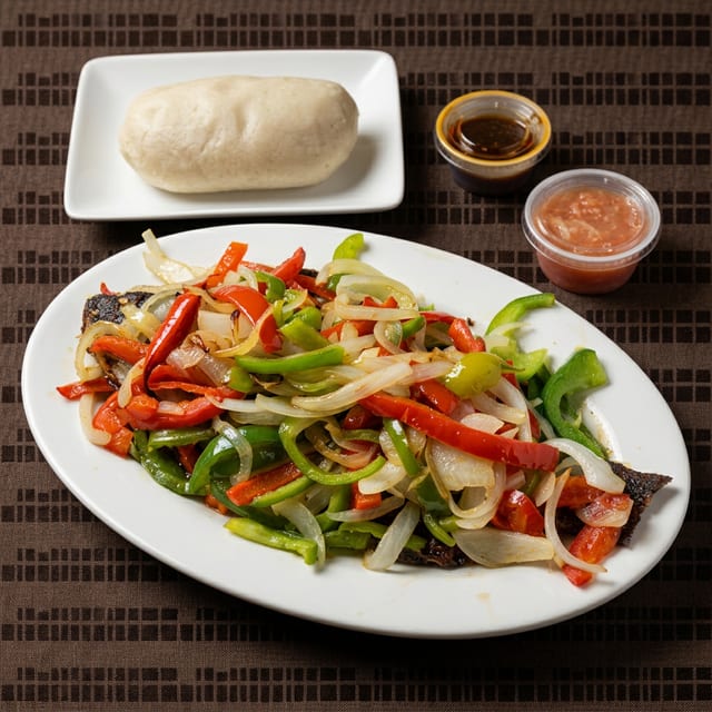 Banku or Kenkey with Tilapia.